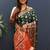 Black silk blend patola saree with zari border and contrast red pallu