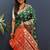 Dark green silk blend patola saree with zari border and contrast red pallu