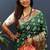 Dark green silk blend patola saree with zari border and contrast red pallu