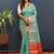 Turquoise silk blend patola saree with zari border and contrast red pallu