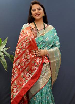 Turquoise silk blend patola saree with zari border and contrast red pallu 3