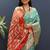 Turquoise silk blend patola saree with zari border and contrast red pallu