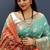 Turquoise silk blend patola saree with zari border and contrast red pallu