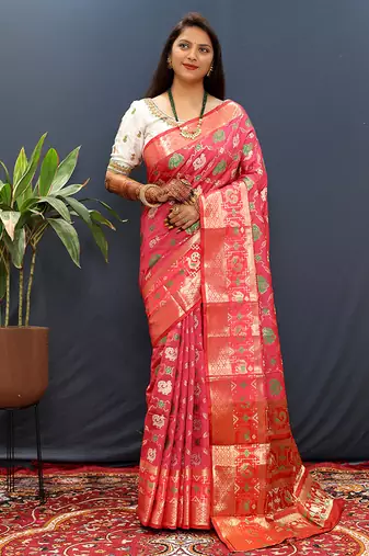 Rani pink silk blend patola saree with zari border and contrast red pallu