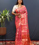Rani pink silk blend patola saree with zari border and contrast red pallu