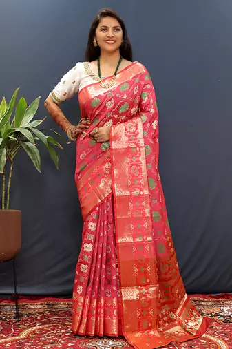 Rani pink silk blend patola saree with zari border and contrast red pallu