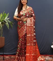 Maroon silk blend patola saree with zari border and contrast red pallu