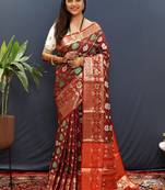 Maroon silk blend patola saree with zari border and contrast red pallu