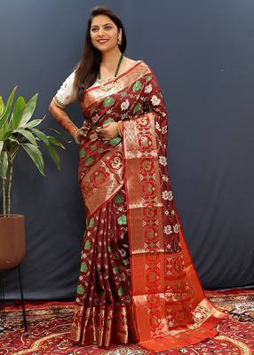Maroon silk blend patola saree with zari border and contrast red pallu 2