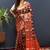 Maroon silk blend patola saree with zari border and contrast red pallu