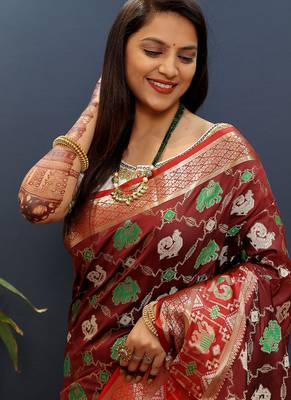 Maroon silk blend patola saree with zari border and contrast red pallu 4