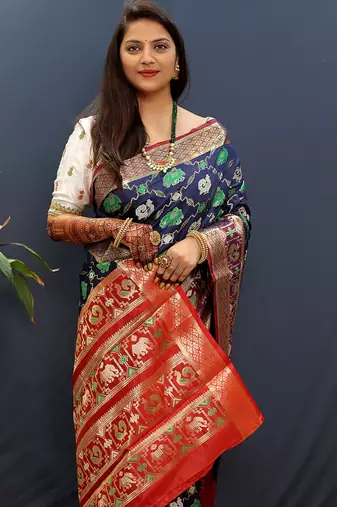 Navy blue silk blend patola saree with zari border and contrast red pallu