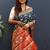Navy blue silk blend patola saree with zari border and contrast red pallu