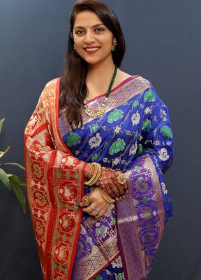 Royal blue silk blend patola saree with zari border and contrast red pallu 4