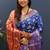 Royal blue silk blend patola saree with zari border and contrast red pallu