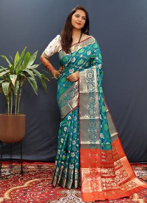 Teal blue silk blend patola saree with zari border and contrast red pallu 1