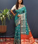 Teal blue silk blend patola saree with zari border and contrast red pallu