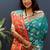 Teal blue silk blend patola saree with zari border and contrast red pallu