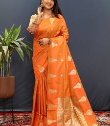 Orange silk blend banarasi saree with golden zari buti and border