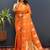 Orange silk blend banarasi saree with golden zari buti and border