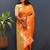 Orange silk blend banarasi saree with golden zari buti and border