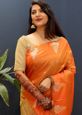 Orange silk blend banarasi saree with golden zari buti and border 4