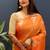 Orange silk blend banarasi saree with golden zari buti and border