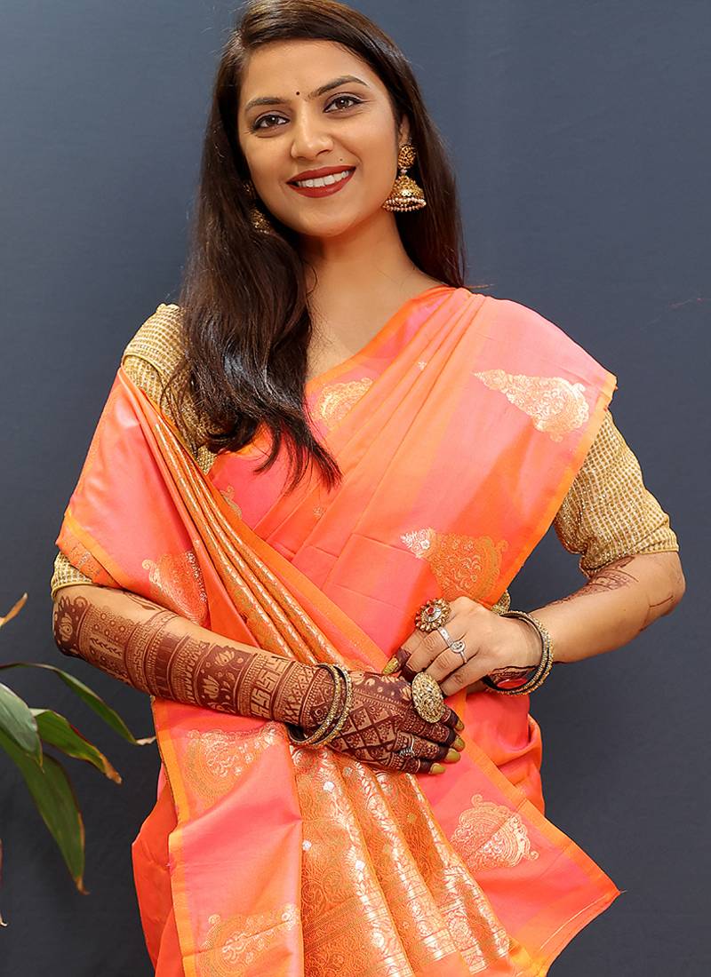 Peach silk blend banarasi saree with golden zari buti and border