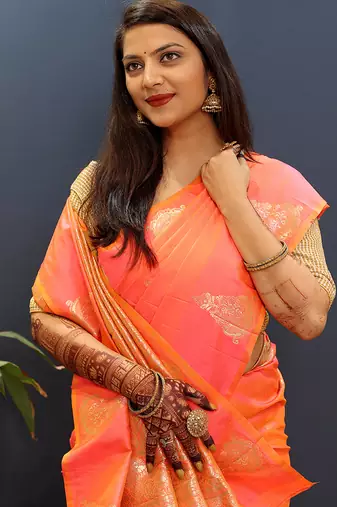 Peach silk blend banarasi saree with golden zari buti and border