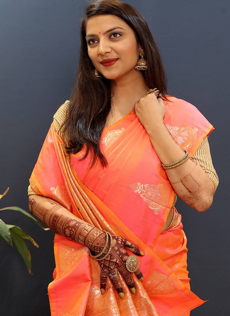 Peach silk blend banarasi saree with golden zari buti and border
