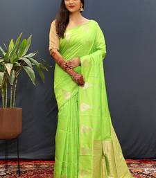 Lime green silk blend banarasi saree with golden zari buti and border