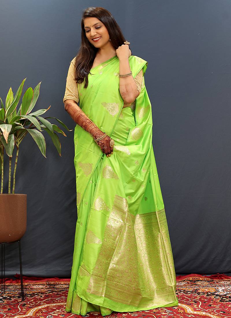 Lime green silk blend banarasi saree with golden zari buti and border