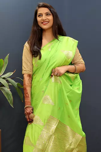 Lime green silk blend banarasi saree with golden zari buti and border