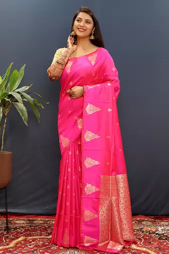 Rani pink silk blend banarasi saree with golden zari buti and border