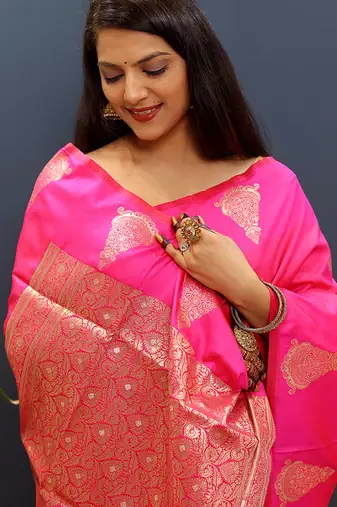 Rani pink silk blend banarasi saree with golden zari buti and border