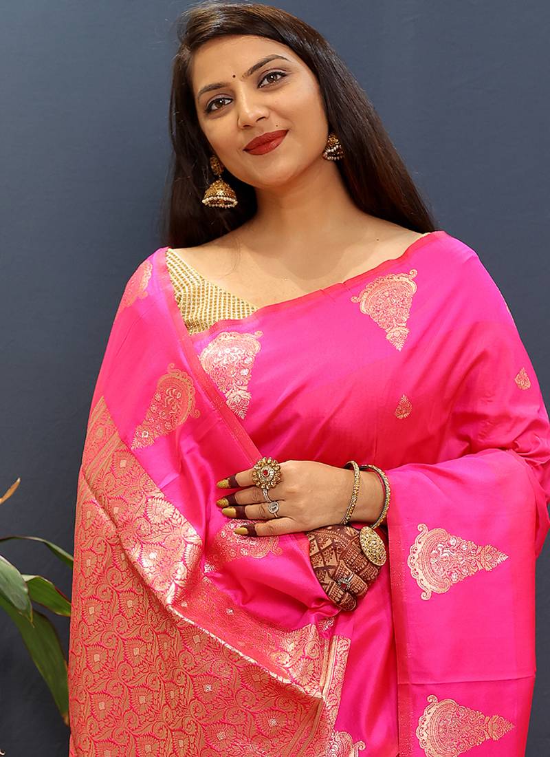 Rani pink silk blend banarasi saree with golden zari buti and border