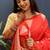 Red silk blend banarasi saree with golden zari buti and border