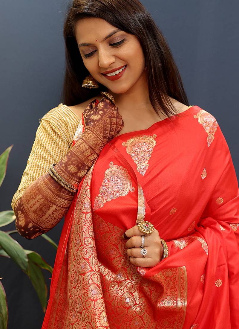 Red silk blend banarasi saree with golden zari buti and border