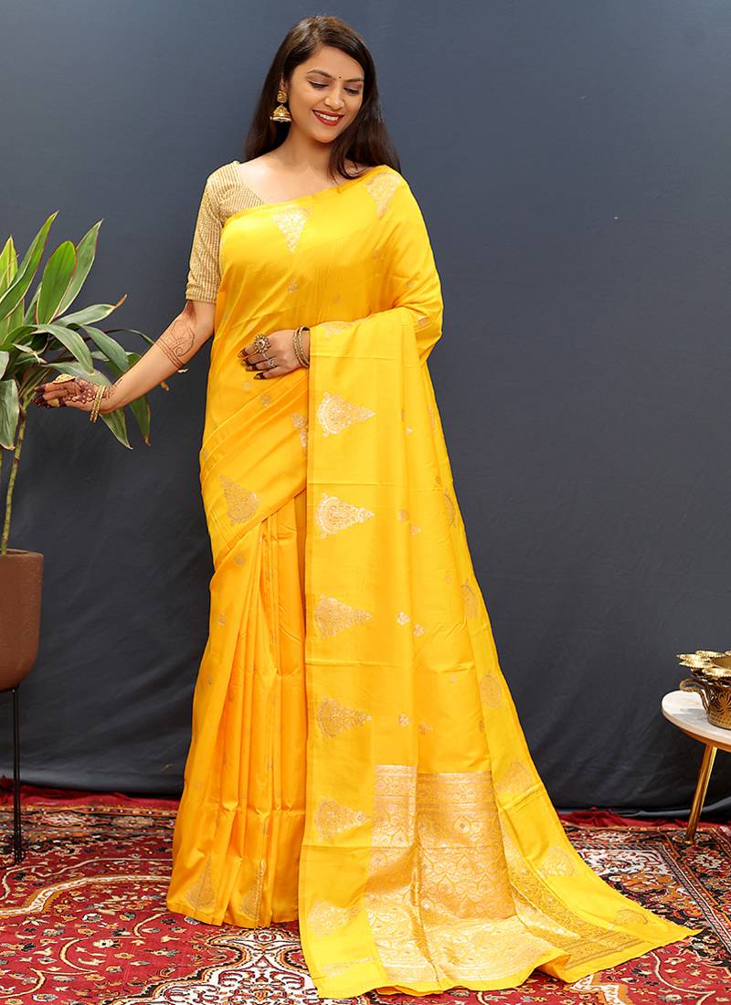 Mustard yellow silk blend banarasi saree with golden zari buti and border