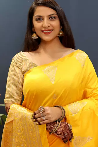 Mustard yellow silk blend banarasi saree with golden zari buti and border