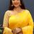 Mustard yellow silk blend banarasi saree with golden zari buti and border