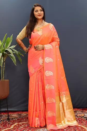 Peach silk blend banarasi saree with golden zari buti and border