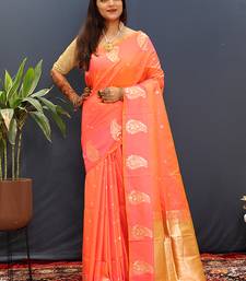 Peach silk blend banarasi saree with golden zari buti and border