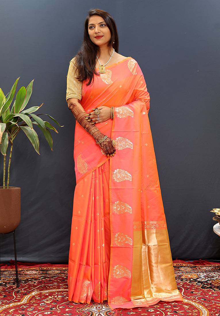 Peach silk blend banarasi saree with golden zari buti and border