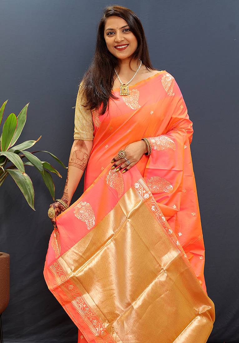 Peach silk blend banarasi saree with golden zari buti and border