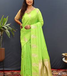 Lime green silk blend banarasi saree with golden zari buti and border