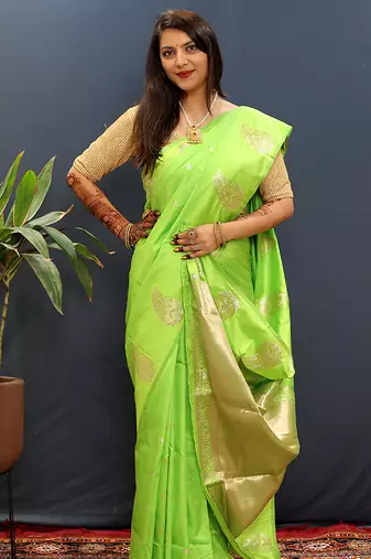 Lime green silk blend banarasi saree with golden zari buti and border