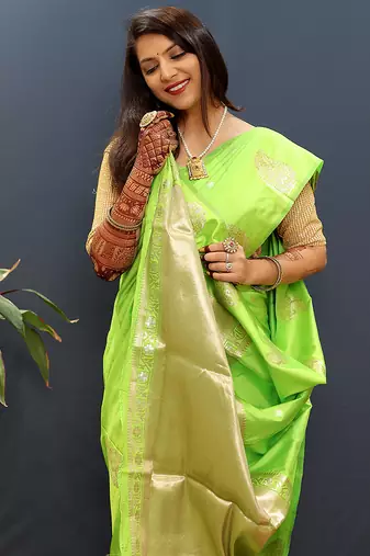Lime green silk blend banarasi saree with golden zari buti and border