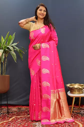 Rani pink silk blend banarasi saree with golden zari buti and border