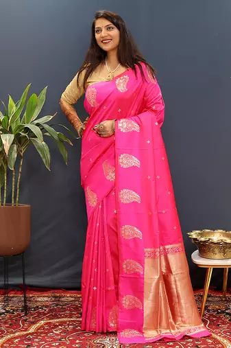 Rani pink silk blend banarasi saree with golden zari buti and border